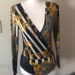 Gold and black bodysuit